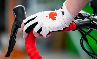 Close-up of cycling glove worn by Marie-Claude Molnar in 2019, depicting Canadian maple leaf.