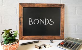 Chalk board showing the word “bonds”