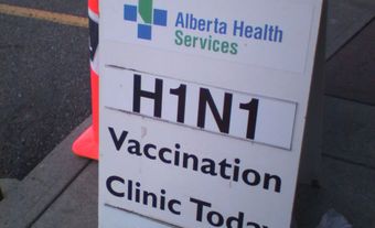 Sign outside a Calgary clinic offering the H1N1 vaccine.