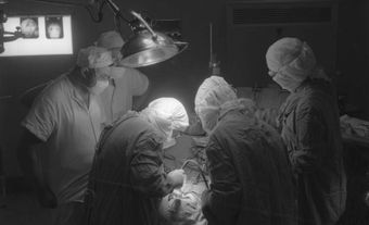 Dr. Wilder Penfield, director of Montreal Neurological Institute and colleagues during surgery, c. 1954.