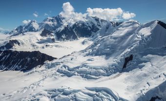 Tall, snowy mountains.